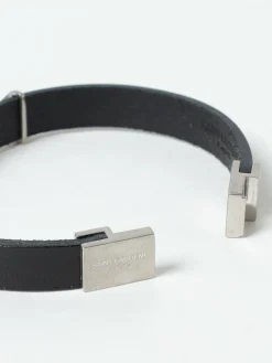 Bracciale Cassandre Saint Laurent in pelle ed ottone