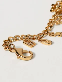 Bracciale Moschino Couture in ottone con charms