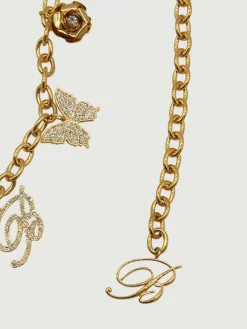 Cintura Blumarine in ottone con charms e strass incastonati