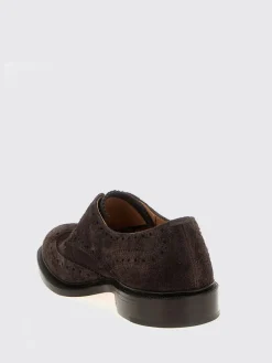 Derby Bourton Tricker's in camoscio con motivo brogue