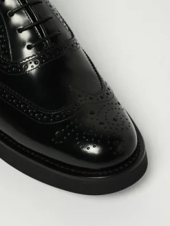 Derby Church's in pelle spazzolata con motivo brogue