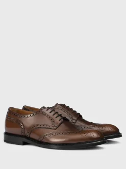 Derby Doucal's in pelle con motivo brogue