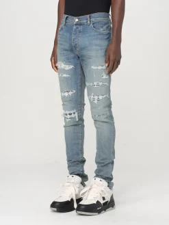 Jeans Amiri in denim distressed