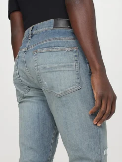 Jeans Amiri in denim distressed