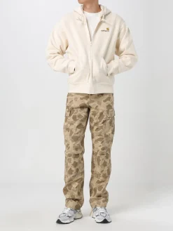 Jeans Carhartt Wip in denim con stampa camouflage