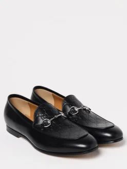 Mocassino Horsebit Gucci in pelle con logo goffrato