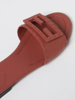 Mules Baguette Fendi in pelle a grana con cuciture a mano