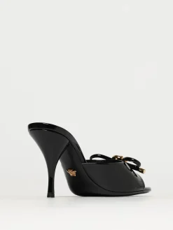 Mules Medusa Versace in vernice con fiocco