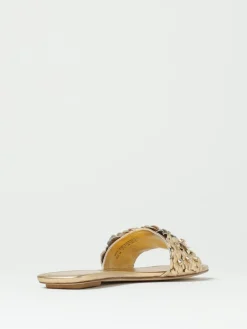 Mules Stuart Weitzman in pelle laminata con fiori applicati