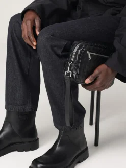 Pochette Bottega Veneta in pelle intrecciata