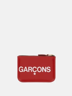 Portamonete Comme Des Garçons in pelle con stampa logo