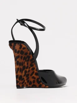 Sandalo Le Scandale Saint Laurent in vernice con zeppa in cavallino animalier