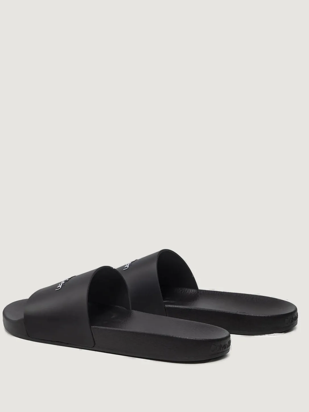 Sliders Calvin Klein in gomma