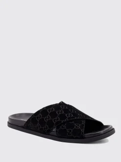 Sliders Gucci in camoscio con monogram GG goffrato