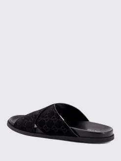 Sliders Gucci in camoscio con monogram GG goffrato