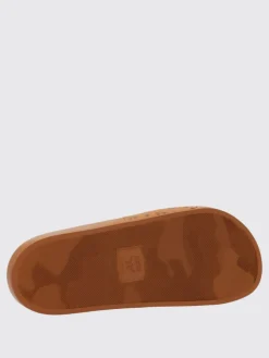 Sliders Mcm in cotone spalmato con logo all over