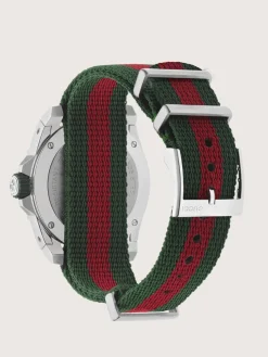 Steel case, green and red bezel, green rubber crown, green dial