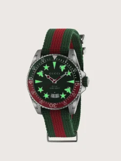 Steel case, green and red bezel, green rubber crown, green dial