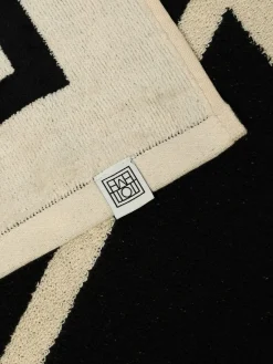 Telo mare con maxi logo Toteme