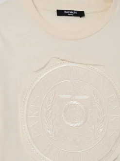 T-shirt in cotone con logo ricamato Balmain