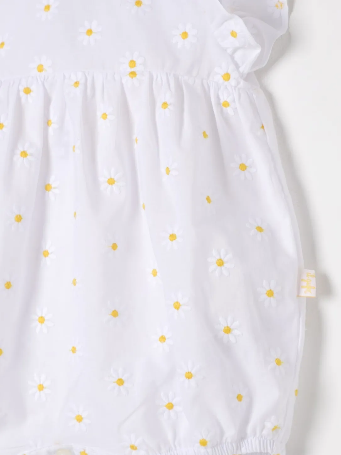 Tuta corta in cotone a fantasia floreale Il Gufo